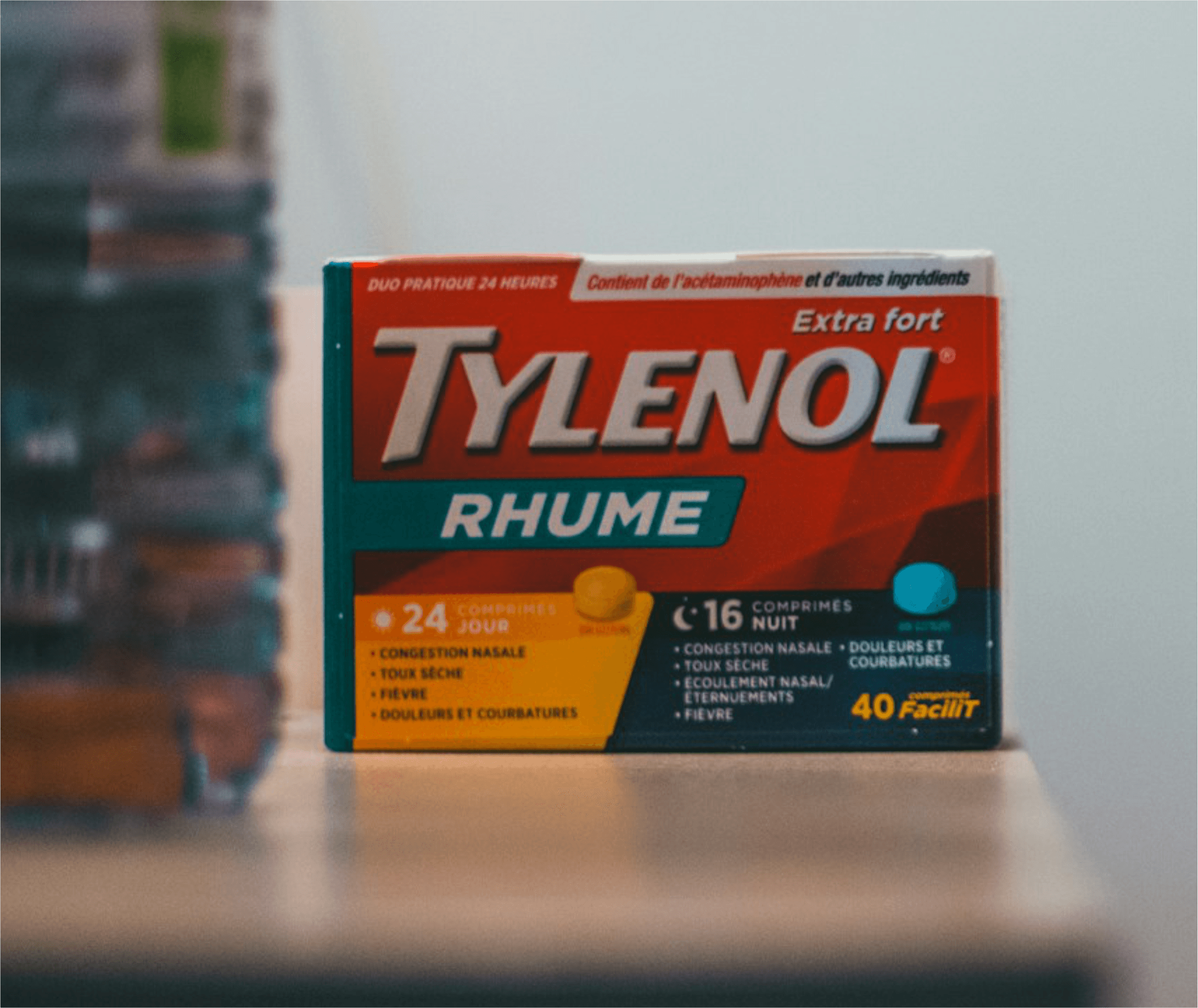 Tylenol Pregnant woman holding Tylenol bottle with warning label highlighting developmental risks